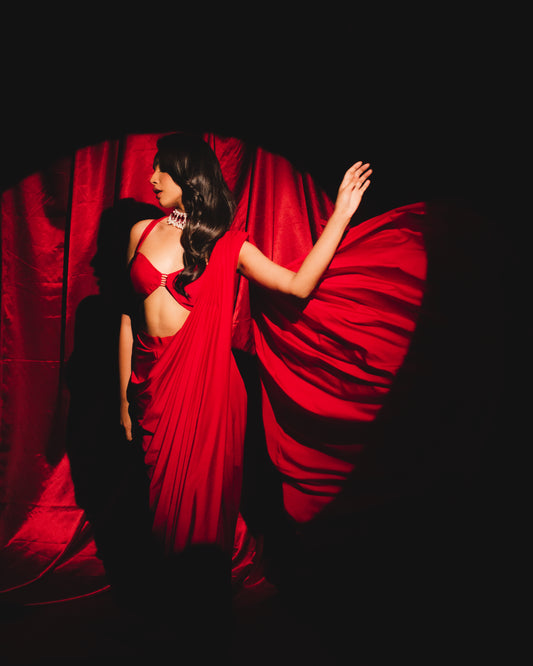 Captivating Crimson Draped Saree with Alluring Blouse: A Dance of Elegance and Seduction