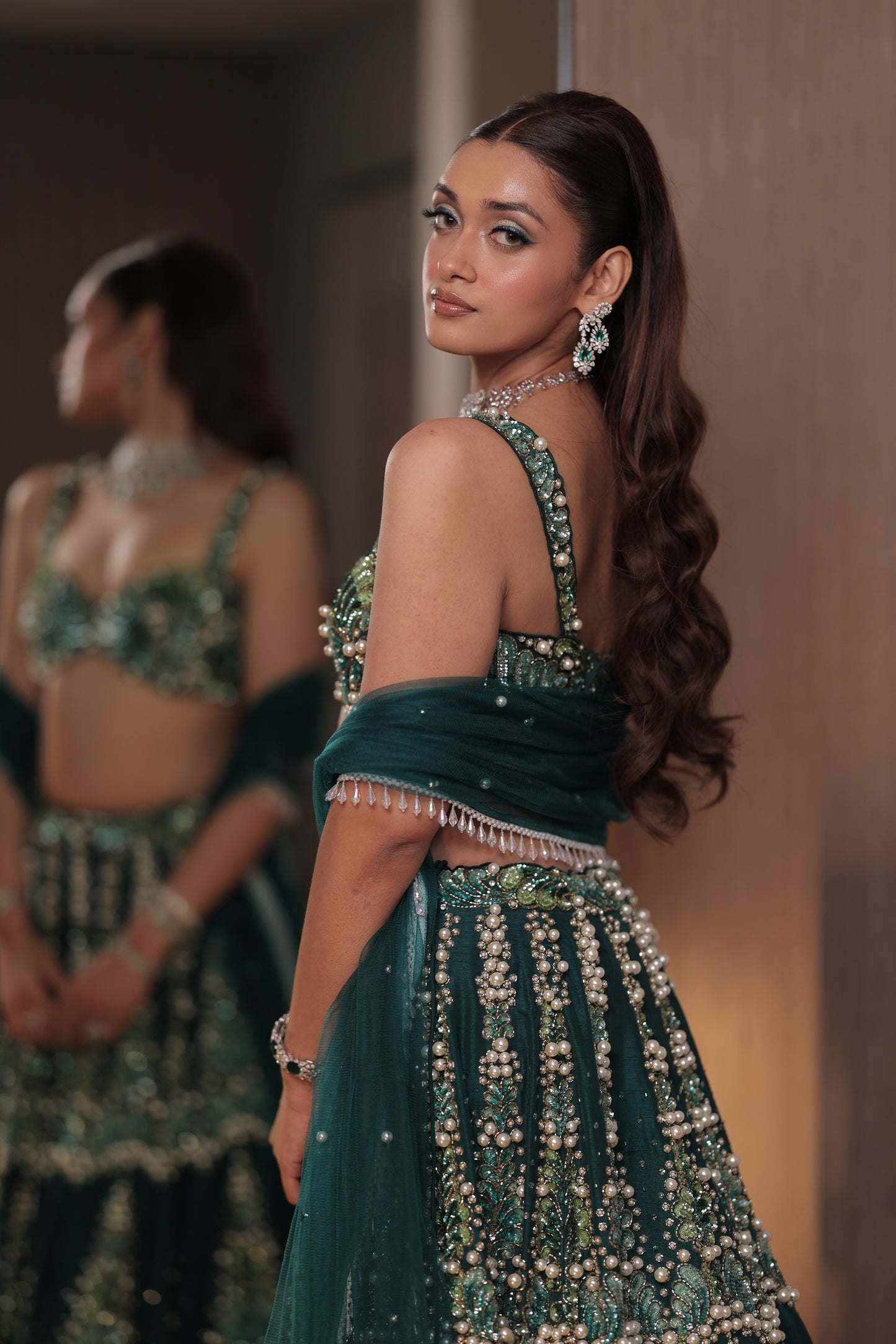 Teal Petals and Pearls: Embroidered Lehenga with Sequins and Cutwork