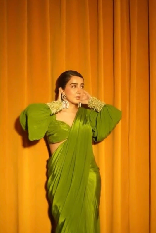 Sanjana Batra X Anshika Tak Label  ( Ruched Allure: Modern Olive Green Draped Saree with Puff and Cuff Sleeves )
