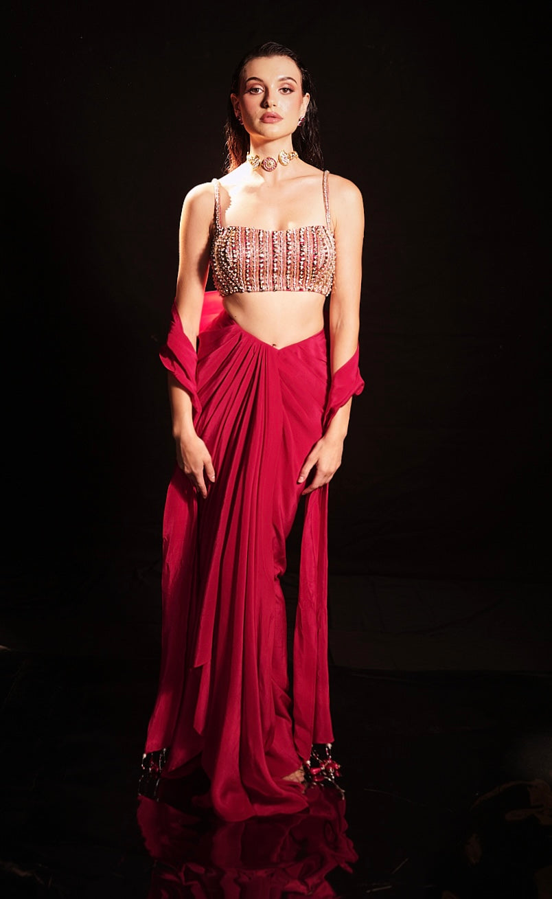 Red draped skirt with embellished strappy blouse
