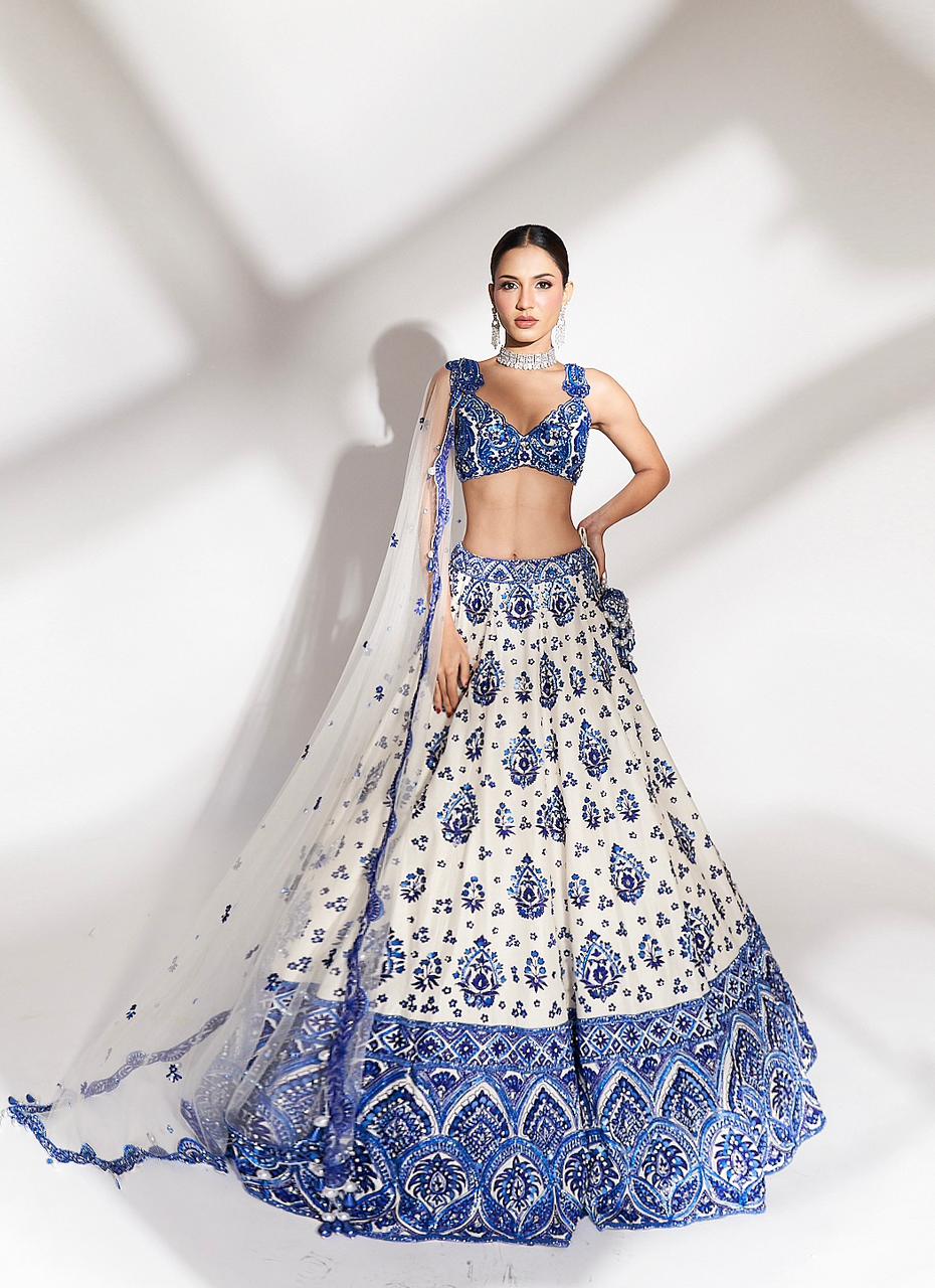 Royal Azure: Blue and White Embroidered Lehenga with Scallop Dupatta Anshika Tak Official Royal Azure: Blue and White Embroidered Lehenga with Scallop Dupatta Anshika Tak Official