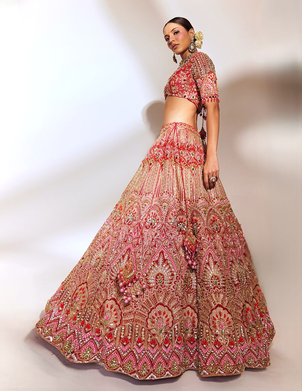 Crimson Majesty: Red Heavily Embroidered Lehenga with Gold and Sequin Detailing