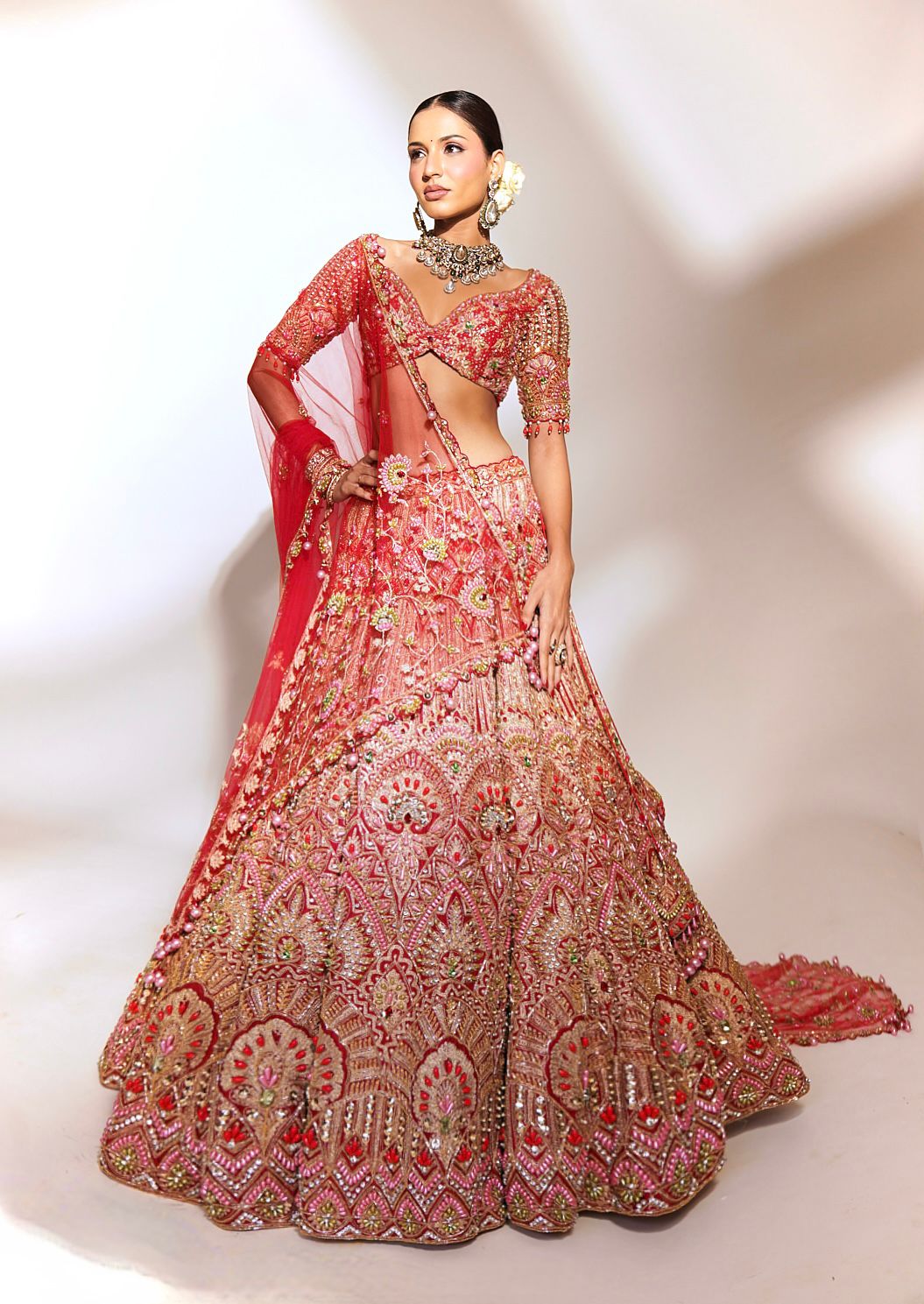 Crimson Majesty: Red Heavily Embroidered Lehenga with Gold and Sequin Detailing