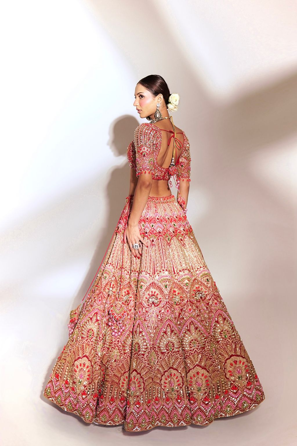Crimson Majesty: Red Heavily Embroidered Lehenga with Gold and Sequin Detailing