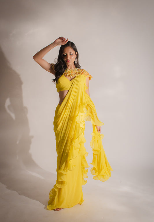 Ruffle Sunshine: Yellow Saree, Strap Blouse, and Embroidered Cape