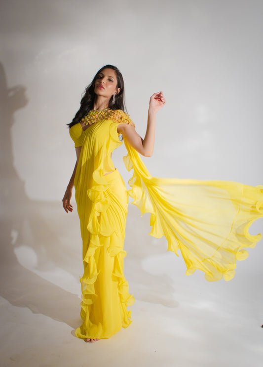 Ruffle Sunshine: Yellow Saree, Strap Blouse, and Embroidered Cape