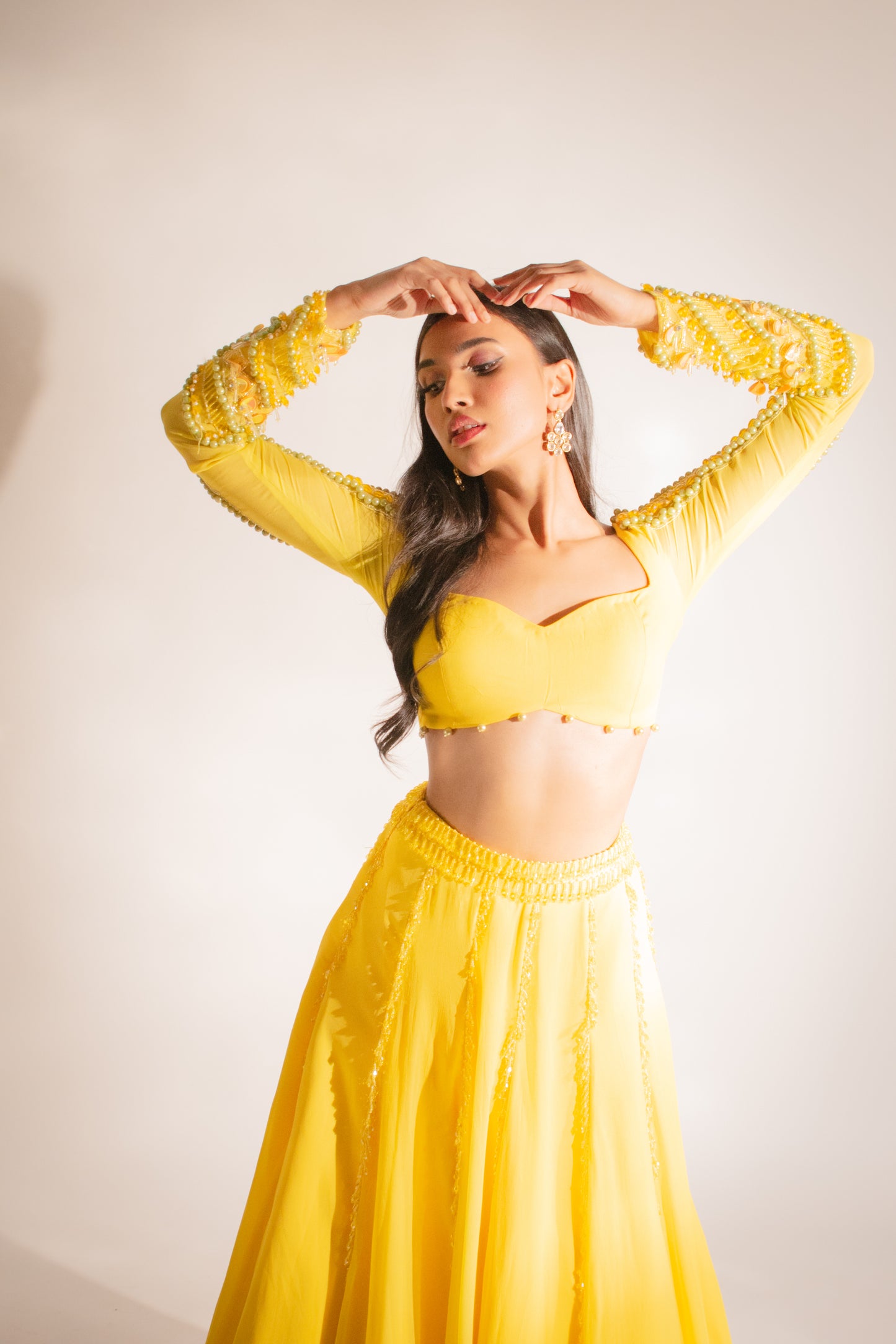 Radiant Opulence: Our Yellow Lengha Set with Exquisite Crystal Embellishments