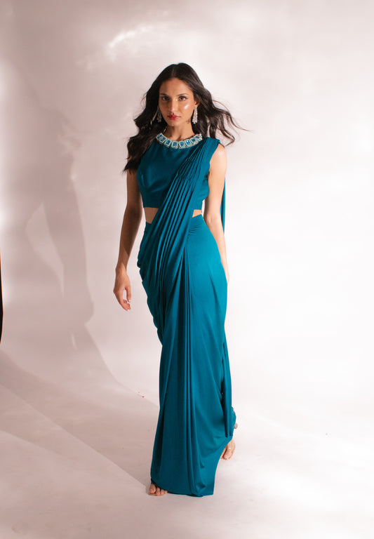Teal Reverie: A Contemporary Classic &- Embellished Pleated Saree Elegance