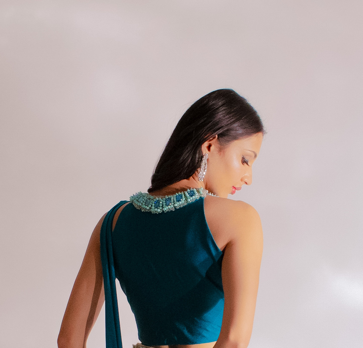 Teal Reverie: A Contemporary Classic &- Embellished Pleated Saree Elegance
