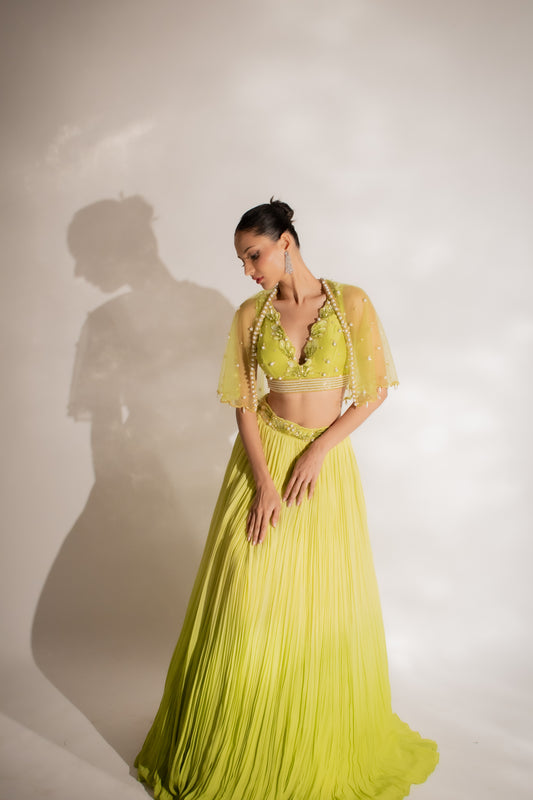 Verdant Majesty: Parrot Green Embroidered Blouse, Cape, and Belted Lehenga
