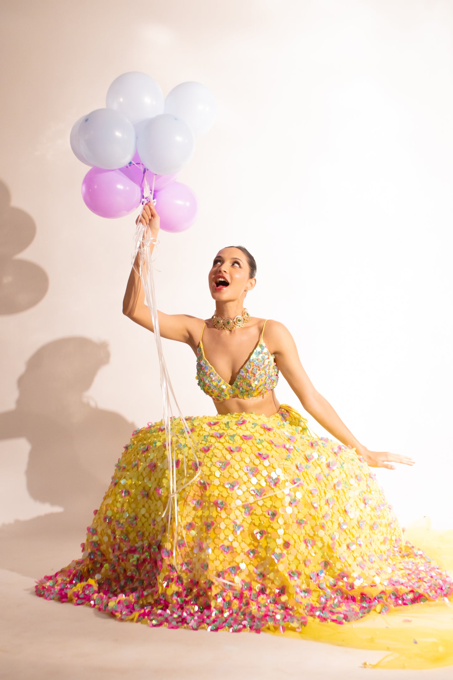 Sunshine Splendor Lengha: A Tapestry of Tassels and Sequins