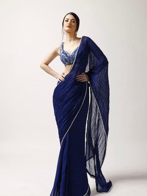 Moonlit Elegance: Midnight Blue Organza Saree with Sleeveless Silk Blouse