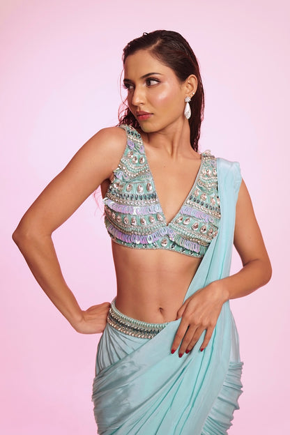 Aqua blue draped saree with embellished V-neck blouse