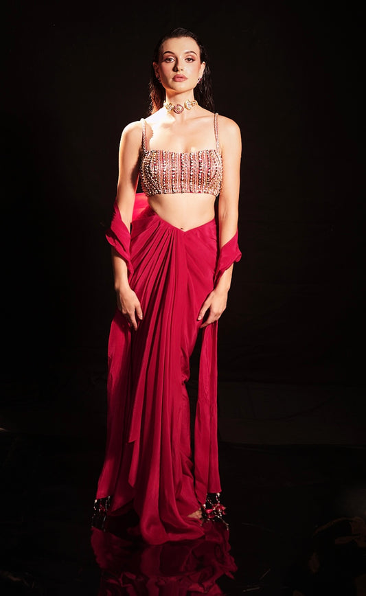 Red draped skirt with embellished strappy blouse