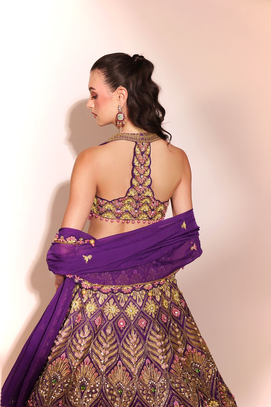 Regal Amethyst: Purple Embellished Lehenga with Gold and Floral Motifs
