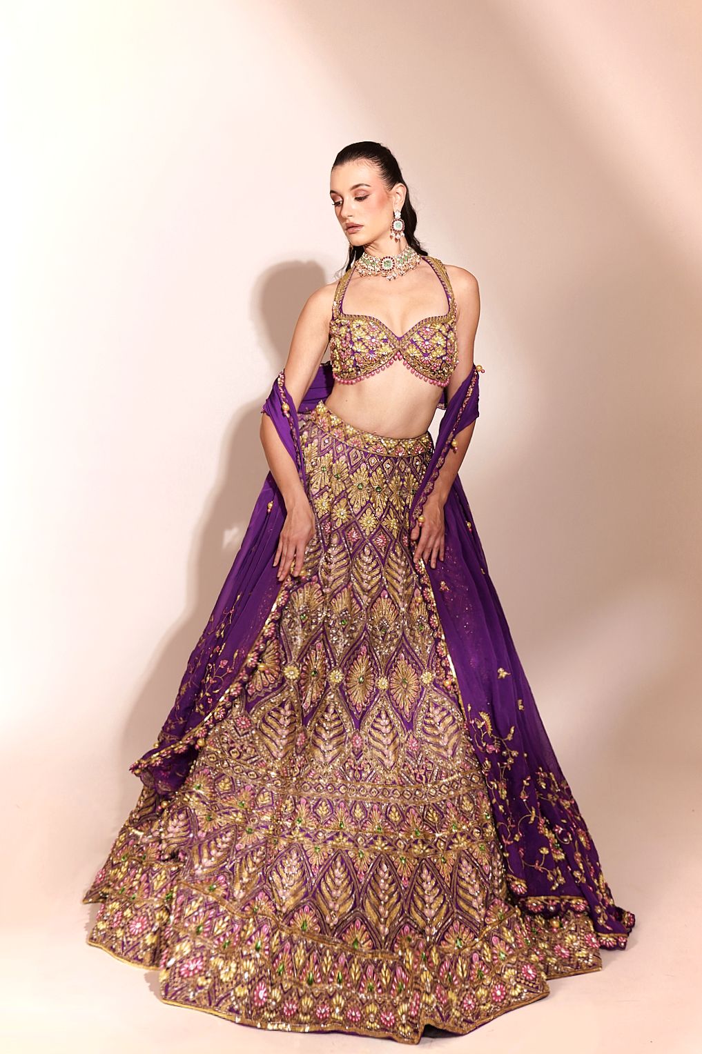 Regal Amethyst: Purple Embellished Lehenga with Gold and Floral Motifs