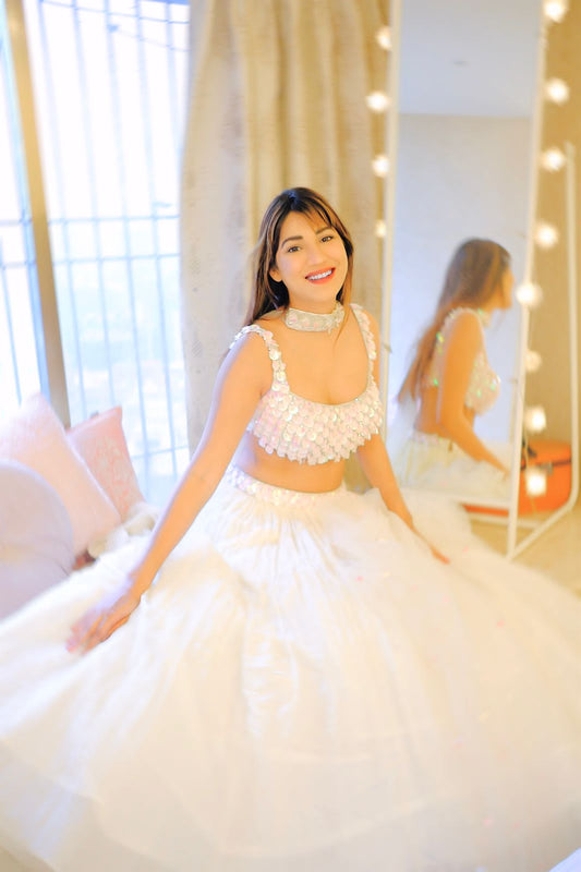 Shivani Singh X Anshika Tak Label (Ivory Sequin Bliss: Ruched Lengha with Tassel Accents )