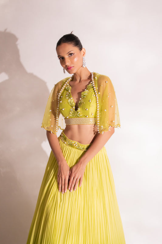 Verdant Majesty: Parrot Green Embroidered Blouse, Cape, and Belted Lehenga
