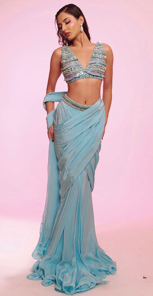Aqua blue draped saree with embellished V-neck blouse